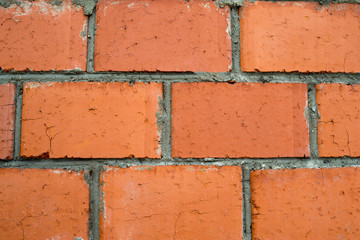 Part of the wall of red brick masonry. Texture, construction.