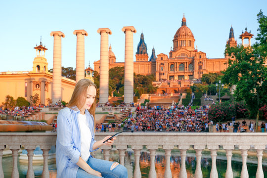 Young happy women tourist travel in Barcelona, Spain. In social media and vacations in europe.
