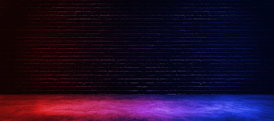 Studio dark room with lighting effect red and blue on black brick wall gradient background for...
