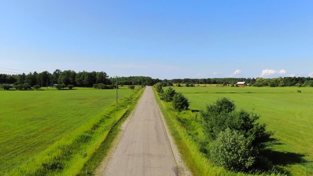 Cycle Touring Road Bikes to Backpacking Camping Travel Trail to Bois Blanc Island and Mackinac Island Country Roads cyclist riding down old country road with farm land fields