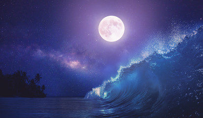 Beautiful night ocean scenery with surfing wave and full moon on tropical background