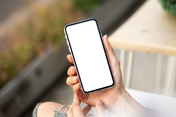 Mockup image blank white screen cell phone.man hand holding texting using mobile.background empty space for advertise text.people contact marketing business,technology 