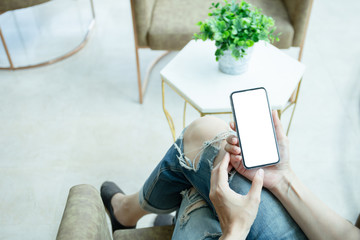 Mockup image blank white screen cell phone.man hand holding texting using mobile.background empty space for advertise text.people contact marketing business,technology 