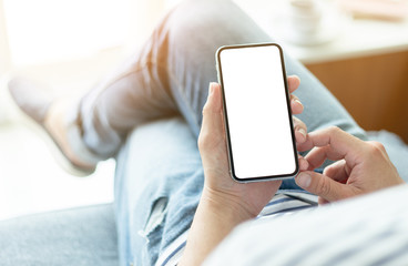 Mockup image blank white screen cell phone.man hand holding texting using mobile.background empty space for advertise text.people contact marketing business,technology 