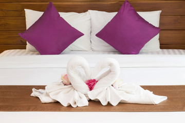 Romantic Two Towels on White Bed Sheet background