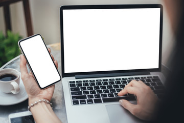 mockup image blank screen computer,cell phone with white background for advertising text,hand man...