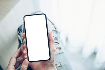 Mockup image blank white screen cell phone.woman hand holding texting using mobile.background empty space for advertise text.people contact marketing business,technology 