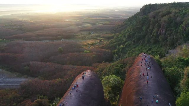 Tourists come to watch the sunrise at 3 Whale's Rock in Bueng Kan Province, Thailand