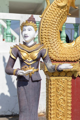 Welcome Angle statue in front of the gate at the temple.