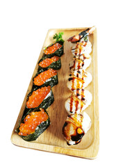 Salmon roe sushi, Eel sushi, abalone clam sushi on a wooden tray