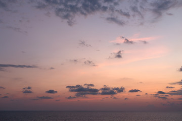 Beautiful pink color clouds on the sky.