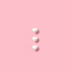 White Hearts on pink background. Minimal valentine concept ideas. 3D Render