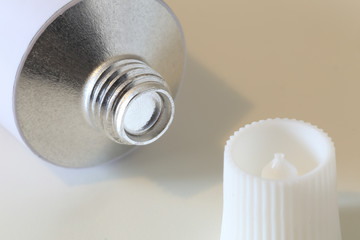 Close-up of a Aluminum Cream Tube. Pharmacy Treatment.