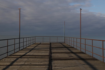Naklejka premium pier at sunset