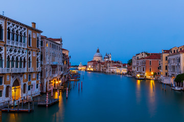 Beautiful long exposure shot of the Grand Canal and Basilica Santa Maria della Salute in Venice, Italy