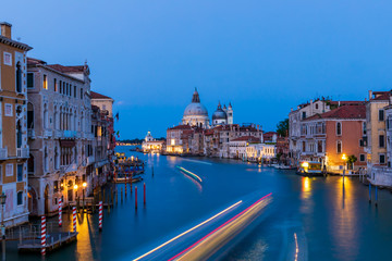 Beautiful long exposure shot of the Grand Canal and Basilica Santa Maria della Salute in Venice, Italy