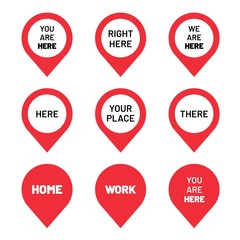 Set of red direction pointers. You are here pin