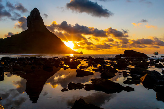 Stunning sunset in Concei&ccedil;&atilde;o beach in Fernando de Noronha, a paradisiac tropical island off the coast of Brazil