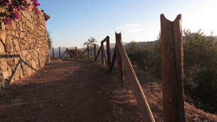 Rural path and broken fence