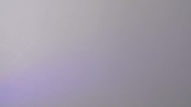 The man counts the money. Counting 100 dollar banknotes on a white table. Close up