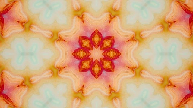 Live wall flower concept. Spring or summer background. Abstract colorful animated kaleidoscope background. Art hypnotic kaleidoscope. 