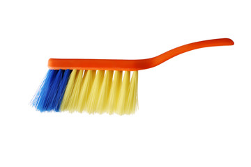 cleaning brush with orange handle and synthetic pile