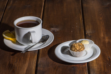 Cup of fresh tea and spoon