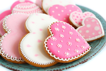 Set of pink heart shaped cookies with patterns, handmade