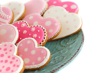 set of pink heart shaped cookies with patterns, handmade