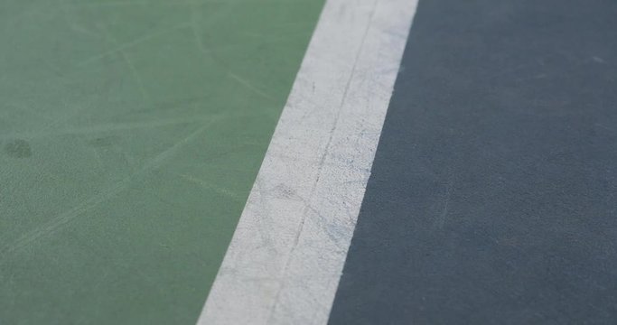 tennis tournament in indoor court, tennis ball hits on the surface of court