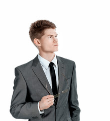 side view. successful young businessman.isolated on a white