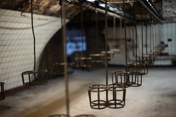 Chain conveyor for transporting wine bottles.