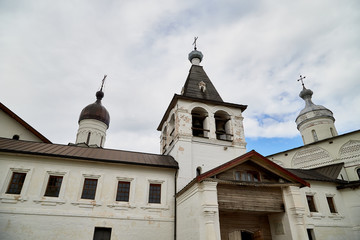 Domes of Ferapontov monastery in a summer day and sky with clouds background