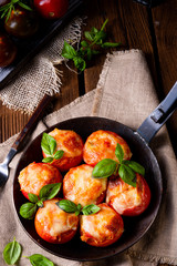 Stuffed tomatoes with minced meat and cheese