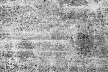 Texture of a concrete wall with cracks and scratches which can be used as a background