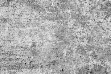 Texture of a concrete wall with cracks and scratches which can be used as a background