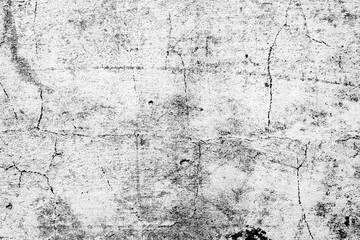 Texture of a concrete wall with cracks and scratches which can be used as a background