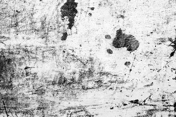 Texture of a concrete wall with cracks and scratches which can be used as a background