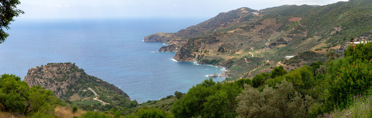 Fototapeta na wymiar Sea bay area with mountain landscape used as banana farming soil. Panorama in high resolution.