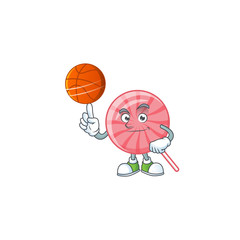 a Healthy pink round lollipop cartoon character playing basketball - 315574961