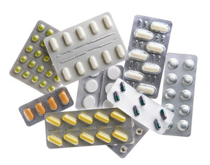 Pills blisters, tablets, vitamins, drugs, capsules, medicament and food supplement for health care. Pharmaceutical industry. Pharmacy. Isolated on white background.