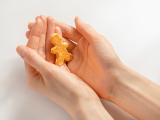  Gingerbread man is in female hands