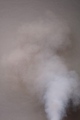 Fototapeta na wymiar Smoke on a photographic background in the studio 50 MP
