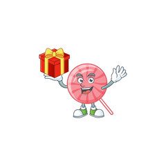 Happy face pink round lollipop cartoon character having a box of gift