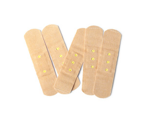 Medical sticking plasters isolated on white. First aid item