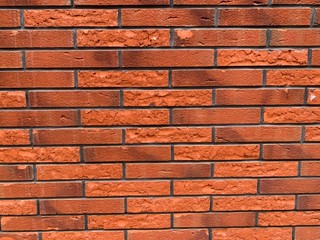 Brick texture. Grungy bricks wall with red bricks for background.