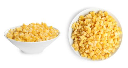 Frozen corn in bowls on white background. Vegetable preservation