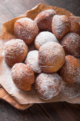 Bunuelos de viento - traditional Colombian sweet deep fried pastry. Spanish Easter doughnut. Mexican golden, crispy-sweet, tortilla-like fritters are sprinkled with sugar
