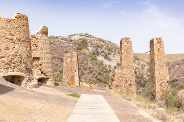 Fototapeta na wymiar Old mining calcination furnaces in Lucainena de las Torres. Almeria, Andalucia, Spain