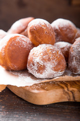 Bunuelos de viento - traditional Colombian sweet deep fried pastry. Spanish Easter doughnut. Mexican golden, crispy-sweet, tortilla-like fritters are sprinkled with sugar